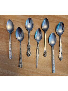7- Mismatched Stainless Steel Teaspoons Floral Handles Various Designs